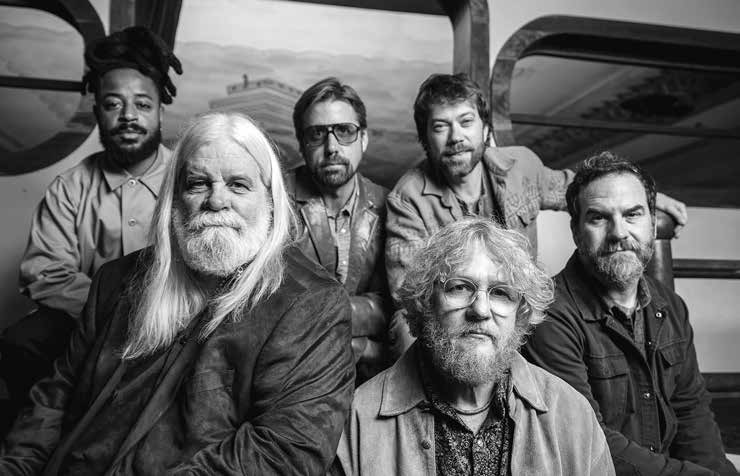 Black-and-white group portrait of the six members of Leftover Salmon.